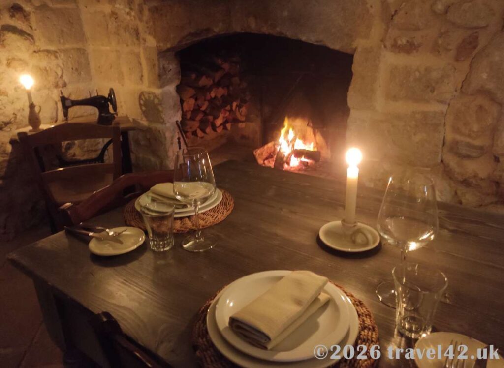 A cosy dinner at Masseria Le Stanzie in a warm atmospheric setting