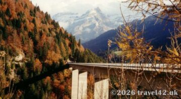 The Grand Muveran rising above the autumn forests