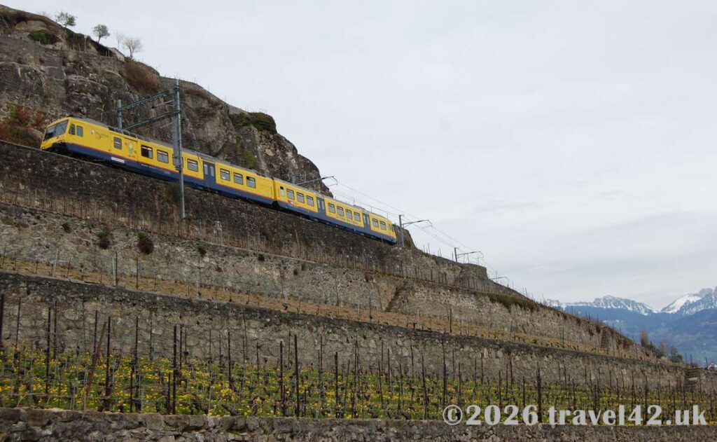 The golden railway of the Lavaux vineyards above Lake Geneva